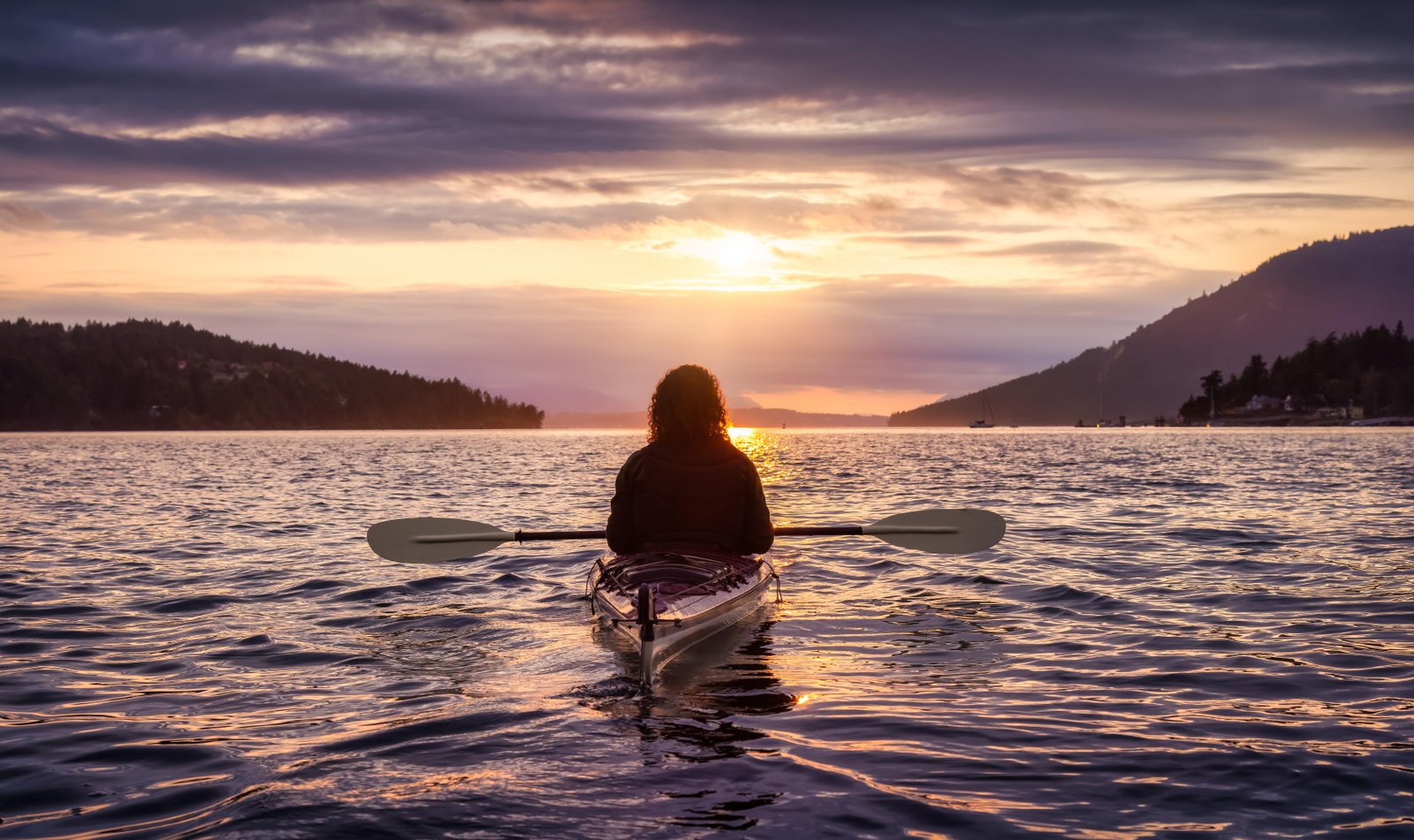 adventurous-woman-on-sea-kayak-paddling-in-the-pac-2025-03-16-01-23-42-utc