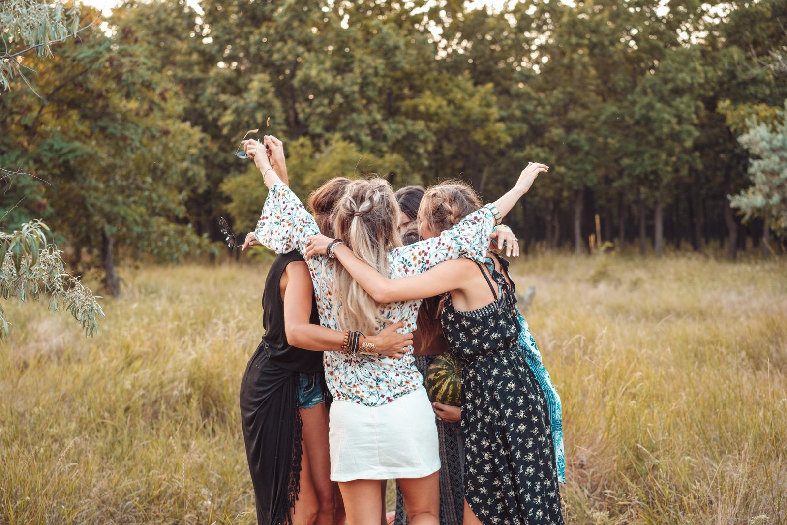 girls-stand-in-a-circle-embracing-each-other-2024-11-01-01-20-49-utc